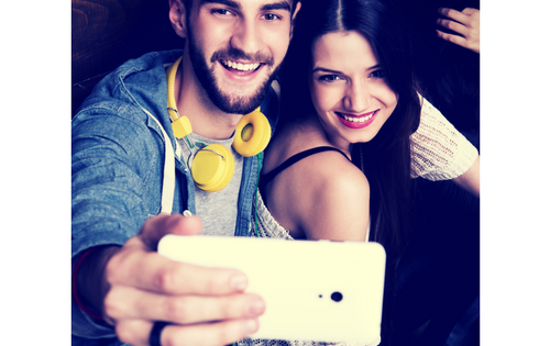 Couple using Facebook Live on a phone